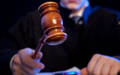 SEC Files Charges in International Investment Scheme